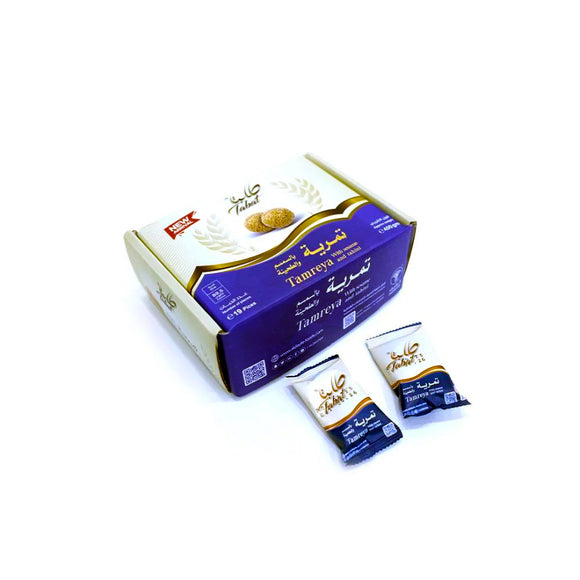 Date Roll Stuffed with Tahini and Covered in Sesame